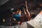 Man climbing indoor boulder wall