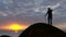 Man climbing a mountain peak