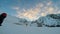 Man Climbing Up Snowy Mountain Ice Axe and Crampons