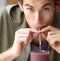 Man, closeup and health smoothie for breakfast fruit drink, morning fibre or healthy detox choice. Male person, portrait