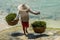 Man collecting seaweed, Nusa Lembongan, Indonesia