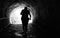 Man coming out of a dark tunnel. black and white