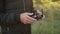 Man controls drony console, close-up