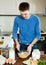 Man cooking omelet with flour