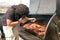 Man Cooks Slabs Of Ribs On Grill At Barbeque Festival