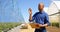 Man counting plants in blueberry farm 4k