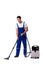 The man in coveralls doing vacuum cleaning on white