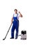 The man in coveralls doing vacuum cleaning on white