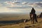 Man cowboy person grass horseback ride outdoors travel animal landscape horse nature