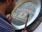 Man creating a plate with decorations on the inside to Bukhara in Uzbekistan.