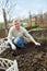 Man cultivates raspberry seedlings