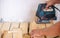 A man cuts a board with an electric saw. Repair of the floor in the house. Selective focus