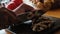 A man cuts champignon with a large metal knife. Food blog. Close-up