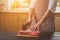 Man cuts of fresh piece of beef on a wooden cutting board in the home kitchen