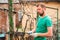 A man cuts grapes close-up. Gardener and pruner for pruning grapes. Autumn and spring pruning of grapes close-up and copy space