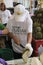 Man cuts open a Durian at a festival