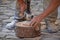 Man cutting ceramic tile with angle grinder