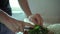 Man Cutting fresh green herbs for a vegetarian salad