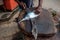 Man cutting fresh tuna with huge knife in Weligama In Sri Lanka.