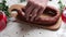 Man is cutting homemade smoked sausage