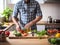 Man Cutting Vegetables On A Cutting Board