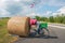 Man cycled in straw bale