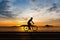 Man cycling at beach