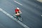 Man cycling on city street, motion