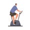 Man cycling on stationary bicycle. Person in sportswear training his endurance on bike equipment. Cardio workout on gym