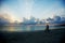 Man cycling with Sunrise Boracay background