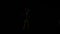 man dances in the dark sticks glow