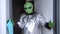 Man decided to play prank on friends and came to visit them in alien costume. Outfit for Halloween themed party