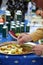 Man degustating bread with olive oil on farmer market in Tuscany, Italy