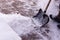 Man digging a path from the snow