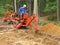 Man digging trench with backhoe