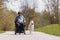 Man with disability with his service dog in park