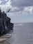 Man diving off a cliff in Hawaii