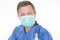 Man doctor in preventive mask against corona virus covid 19