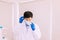 Man doctor or scientist wearing surgical mask for protective coronavirus