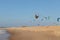 Man does funny things with the kite. Hang gliding