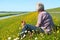 Man and dog on Dutch wadden island Texel