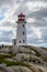 Man and Dog Visiting the Peggy`s Cove Lighthouse