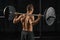 Man doing back squats exercise with a barbell