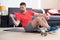 Man doing body exercise and working out at home