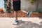 Man doing calf exercise using resistance bands