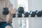 Man doing concentration curls exercise working out with dumbbell