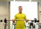 Man doing exercise with barbell in gym