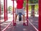 A man is doing exercises on his feet. Sporty and healthy young man with perfect body exercising outdoors.