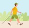 Man doing nordic walking, exercising. A young man walks on foot with walking sticks in nature. Healthy lifestyle