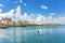 Man doing paddle surfing in the Hamakawa fishing port in the vicinity of the American Village in Chatan City of Okinawa